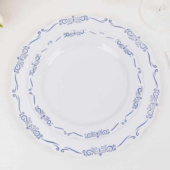 Elegant white plates with blue decorative borders, stacked together.