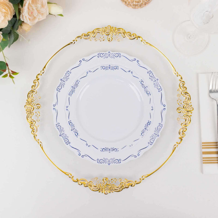 Elegant gold-rimmed decorative plate set with intricate blue floral design.