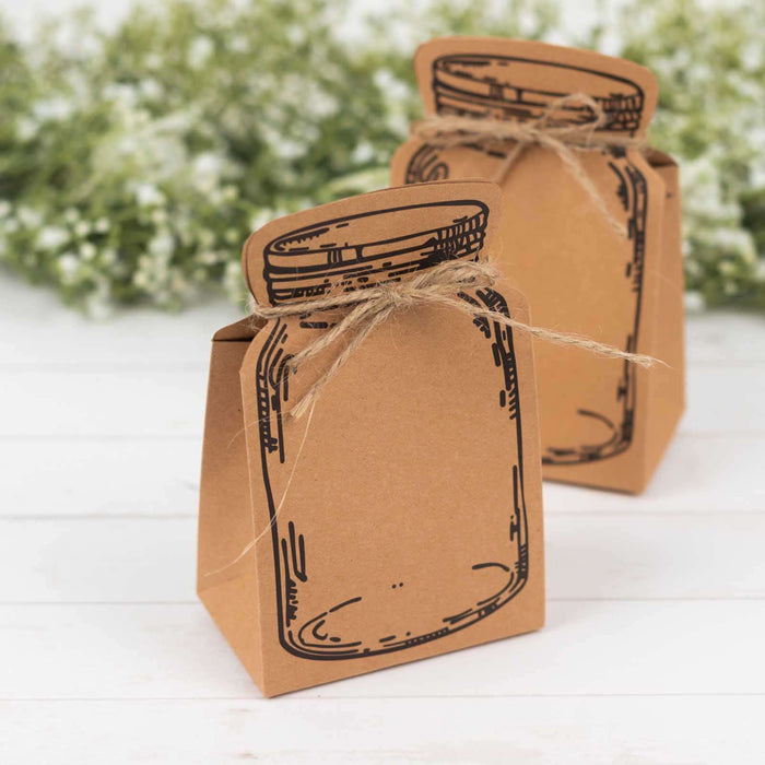 Brown paper gift bags with mason jar design and twine ties.