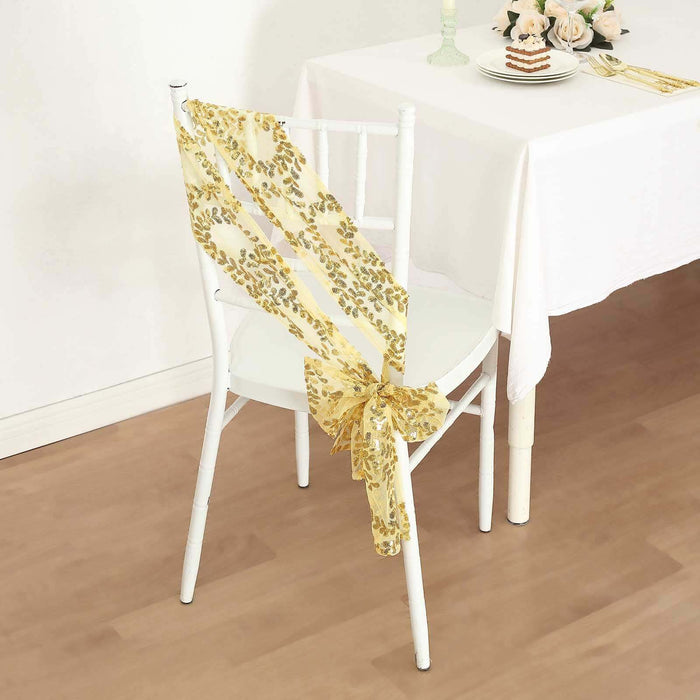 Yellow decorative chair sash draped on a white chair.