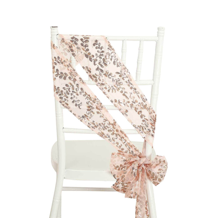 Pink and gold sequin chair sash draped on a white chair