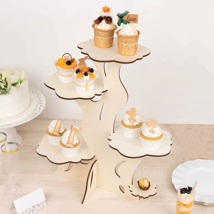 Cupcake stand displaying decorated cupcakes and desserts for a celebration.