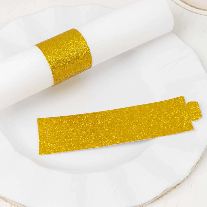 Gold glitter party hat band on a white plate.