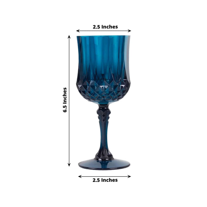 Blue crystal goblet with diamond pattern, 6.5 inches tall, 2.5 inches wide.