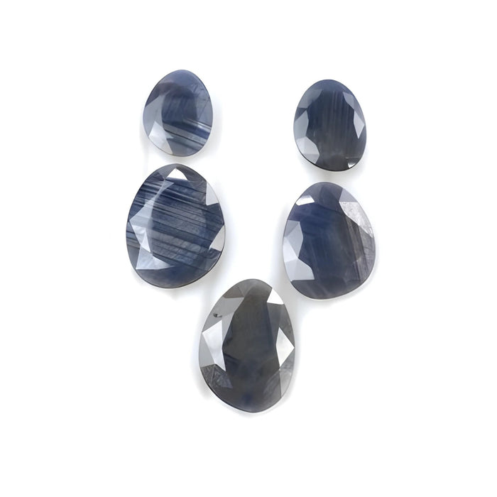blue sheen sapphire uneven faceted cut