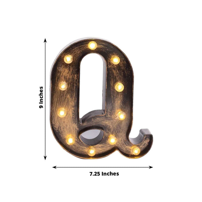 Marquee letter "Q" sign with lights, 9 inches tall, 7.25 inches wide.