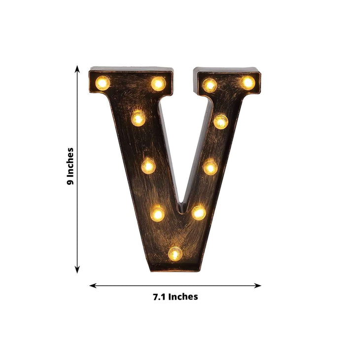 Illuminated marquee letter "V" with lights, 9 inches tall and 7.1 inches wide.