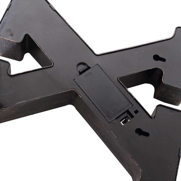 Black decorative letter "X" with switchable LED light feature