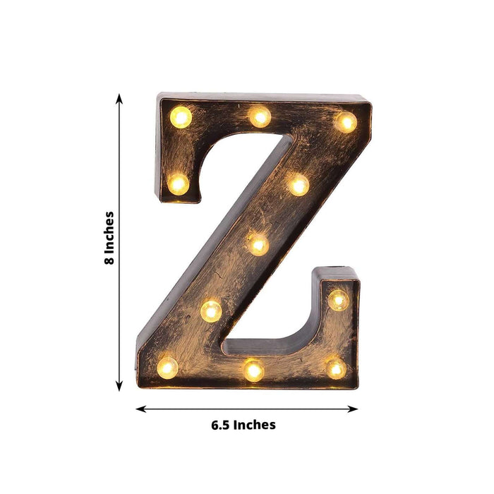 Lighted marquee letter "Z" with bulbs, 8 inches tall and 6.5 inches wide.