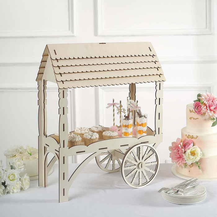 Wooden dessert cart with cupcakes and flowers, perfect for events and celebrations.