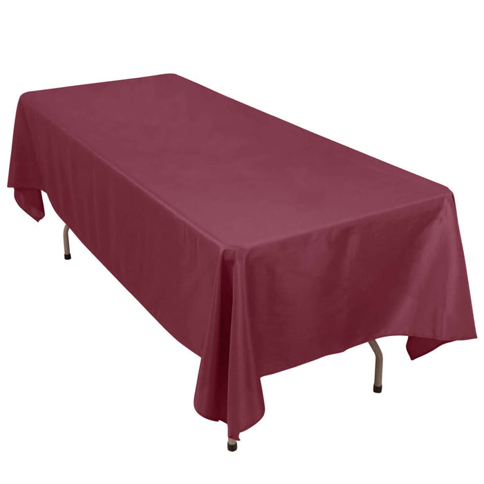 Maroon tablecloth draped over a rectangular table