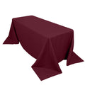 Burgundy tablecloth on a rectangular table