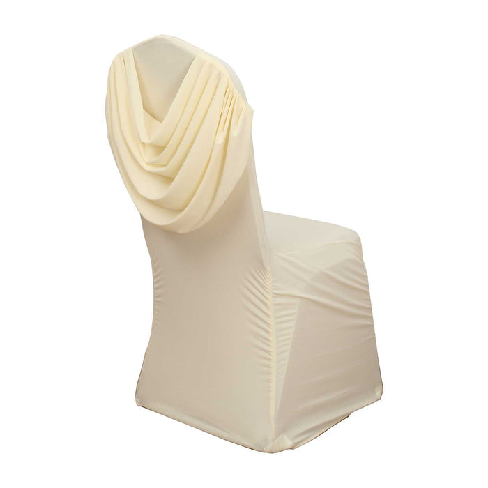 Cream draped chair cover on a white backdrop