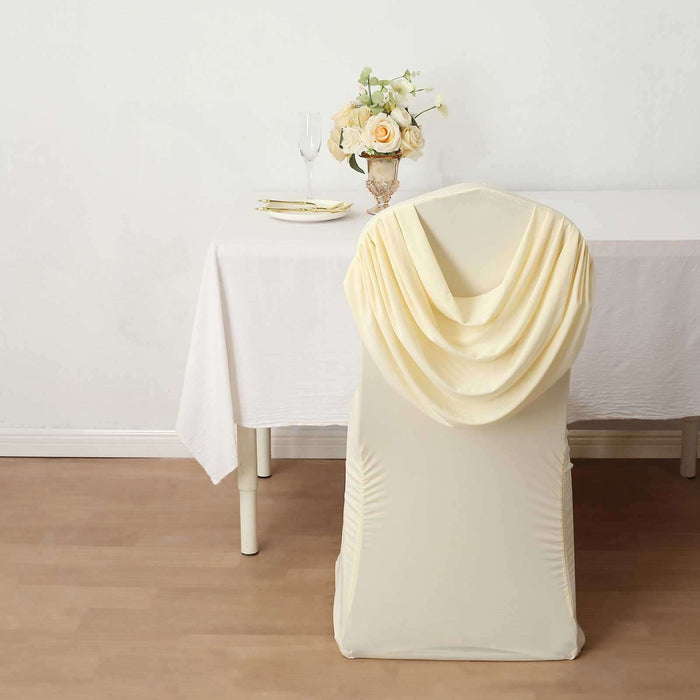 Elegant cream chair cover draped with soft fabric, enhancing event decor.