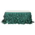 Green table skirt with a ruffled design, perfect for events and parties.