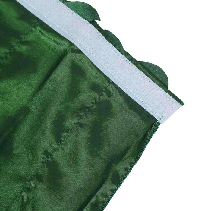 Green fabric with scalloped edge and white trim detail